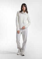 MAGLIA IN LANA A COLLO ALTO IN LUREX BIANCO | DEHA