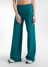 PANTALONI AMPI JERSEY STRETCH TINTA UNITA VERDE - PEACOCK GREEN | DEHA