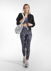 SET TOP SPORTIVO E LEGGINGS ALLOVER IN MICROFIBRA NERO - Active Sets | DEHA