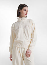 FELPA CON ZIP E DETTAGLIO IN VISCOSA EFFETTO STROPICCIATO BIANCO - CREAM | DEHA