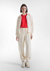 JOGGER PLISSÉ CON DETTAGLIO IN VISCOSA EFFETTO STROPICCIATO BIANCO - CREAM | DEHA