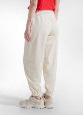 JOGGER PLISSÉ CON DETTAGLIO IN VISCOSA EFFETTO STROPICCIATO BIANCO - CREAM | DEHA