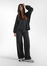 TUTA FELPA E PANTALONE A VITA BASSA CON DETTAGLI SATINATI NERO - Tute e Comfort Sets | DEHA