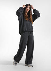 PANTALONI A VITA BASSA CON DETTAGLI SATINATI NERO - BLACK | DEHA