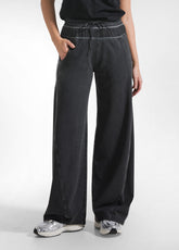 PANTALONI A VITA BASSA CON DETTAGLI SATINATI NERO - BLACK | DEHA