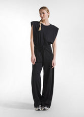 TUTA JUMPSUIT IN JERSEY CON APERTURA SUL RETRO NERO - BLACK | DEHA