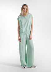 PANTALONI PALAZZO IN SATIN VERDE - JADE GREEN | DEHA