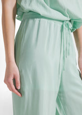 PANTALONI PALAZZO IN SATIN VERDE - JADE GREEN | DEHA