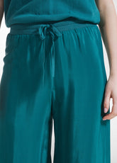 PANTALONI PALAZZO IN SATIN VERDE - PEACOCK GREEN | DEHA
