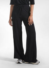 PANTALONI PALAZZO IN MAGLIERIA BOUCLE' NERO - BLACK | DEHA