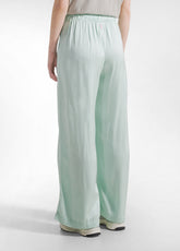 PANTALONI PALAZZO IN SATIN VERDE - JADE GREEN | DEHA