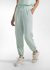 COMPLETO TOP E PANTALONI JOGGER IN JERSEY E SATIN VERDE - | DEHA