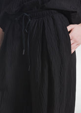 COMPLETO T-SHIRT AMPIA E PANTALONI LARGHI IN VISCOSA EFFETTO STROPICCIATO NERO - Tute e Set Coordinati | DEHA