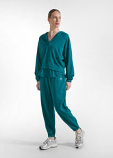 FELPA CON CAPPUCCIO E DETTAGLI EFFETTO PARACHUTE VERDE - Felpe e Maglie | DEHA