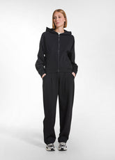 SWEAT-SET MIT REISSVERSCHLUSS UND HOSE MIT FALTEN AUS PUNTO MILANO IN SCHWARZ - | DEHA