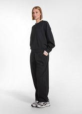 PANTALONE PUNTO MILANO CON PIEGHE SUL FONDO NERO - BLACK | DEHA
