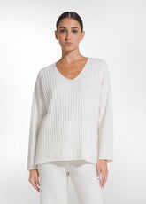 SET AUS LANGEM PULLOVER UND STRICKHOSE MIT PAILLETTEN IN WEISS - | DEHA