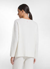 SET AUS LANGEM PULLOVER UND STRICKHOSE MIT PAILLETTEN IN WEISS - | DEHA
